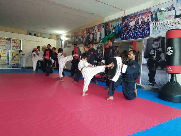 young tiger kung fu and wushu school master shakil babul black in red belt ustad ostad martial art school